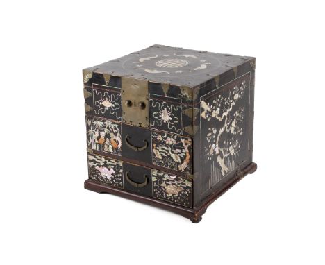 A Korean Joseon dynasty black lacquer and mother-of-pearl table cabinet. Decorated with a roundel of four bats and a shou sym