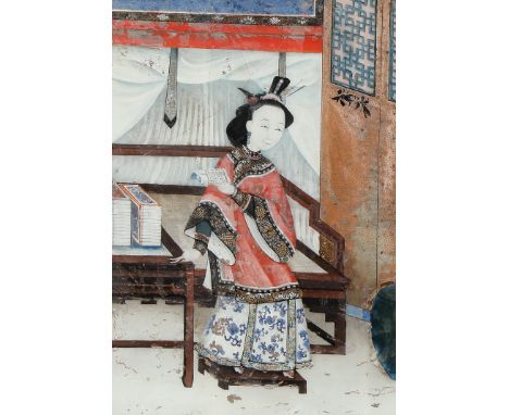 A 19th century Chinese reverse glass painting. Depicting a lady reading a book seated at a table in an interior. In a wooden 