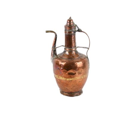 A large Persian style copper ewer. With stepped hinged lid over a narrow neck and bulbous body. H41cm