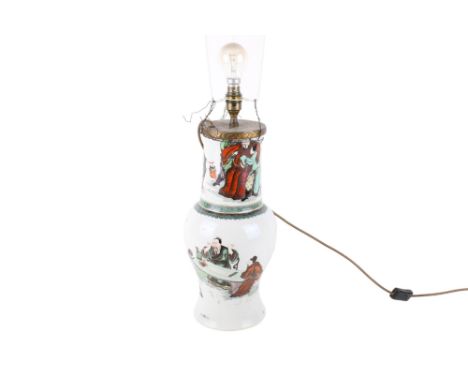 A Qing dynasty Chinese famille verte vase converted into a table lamp. Decorated with figures and a poem about drinking wine 