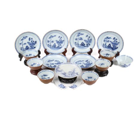 A group of 18th century Chinese blue and white bowls and saucers. Comprising five tea bowls and six saucers with cafe au lait