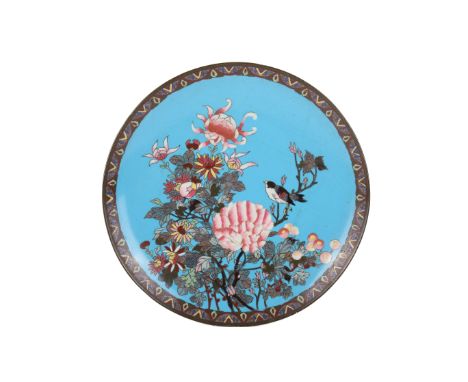 A Japanese Meiji period cloisonné charger. With a bird amongst various flower, on a turquoise blue ground. Diameter 29.8cm.  