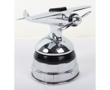 Aviation Themed Table Lighter, chrome Swiss made musical table lighter in the form of a aircraft. Stands 10 ½ cms. 