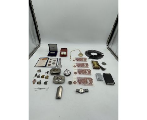 Assorted Lot to include Fine Silver 1 Ounce Bar, Old Banknotes, Watches, Zippo Lighter, and other. 