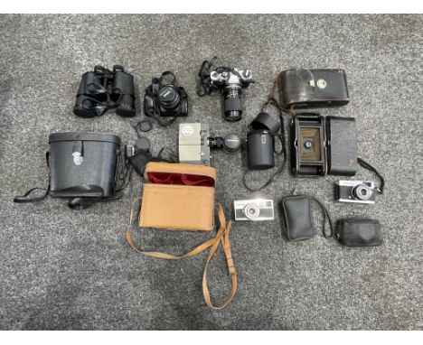 Collection of Vintage Cameras to include Minolta, Olympus, Sankyo, and others. 