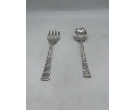 K. Uyeda Sterling Silver Knife and Spoon. 
Total Weigh of Silver 188gr.