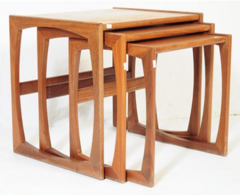 A 1970's retro vintage teak wood graduating nest of tables by&nbsp;R Bennett - G Plan - Quadrille pattern. The three nesting 