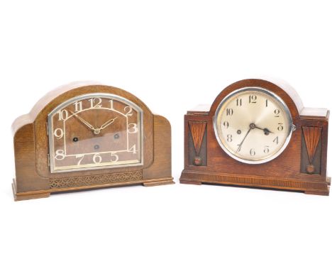 Two early 20th century Art Deco circa 1920s mantel clocks. 8 day clock with arched top with carved decoration and reeded work