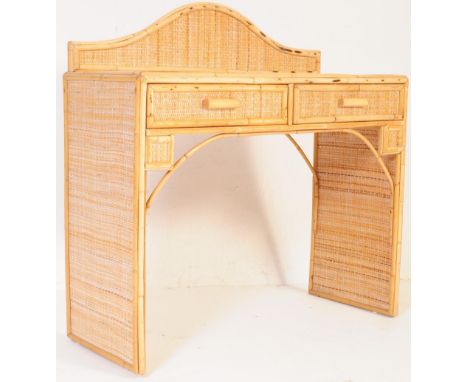 A retro vintage 20th century wicker rattan side table desk having a shaped fitted gallery back to top over two pull handles d