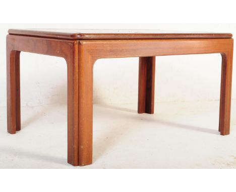 A retro vintage mid 20th century G-Plan teak tile top occasional coffee table having repeating geometric pattern to top on wh