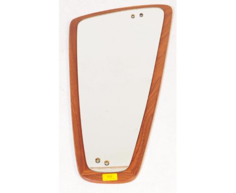A vintage 20th century veneered teak wall mirror. Having a veneered wood back with shaped mirror front atomic sputnik style. 