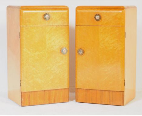 A pair of vintage 20th century Art Deco circa 1940's birds eye maple bedside cabinets. Of square form with cross banded maple