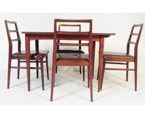 A retro vintage mid 20th century Richard Hornby teak extending dining table and four chairs. Of rectangular form with taperin