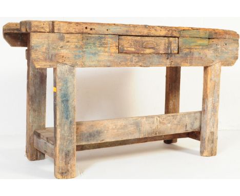 A mid 20th century pine work table / bench. Having a straight top with fitted work surface and fitted back slat. Single drawe