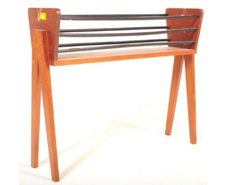 A retro vintage mid 20th century circa. 1960's planter plant stand&nbsp; having ebonised rails over tapering splayed supports