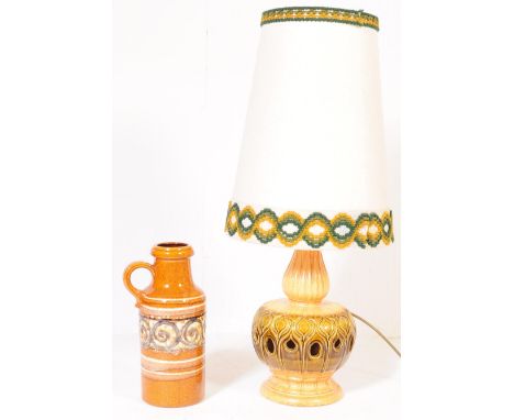 A vintage retro mid 20th century West German pottery fat lava lamp. Marked DA 526. The base being pierced with green drip gla