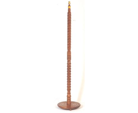 A retro vintage mid 20th Century solid wood floor standing 'Pineapple' lamp stand. Fully detailedcarved body on a solid wood 