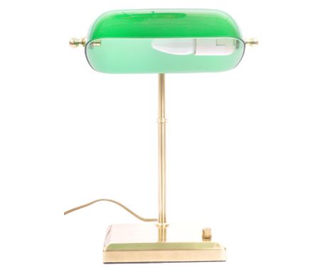 A vintage 20th century gilt metal &amp; glass banker's style desk top table lamp light with a dome shaped glass shade over a 