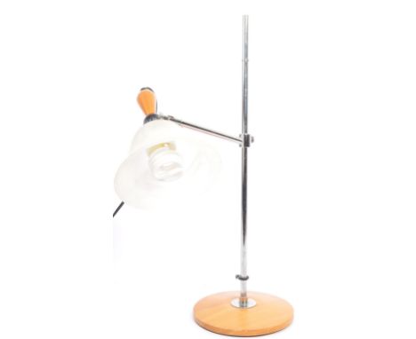 A vintage retro mid 20th century 1960's style space age lamp/. The lamp having circular teak base with chrome supports and gl