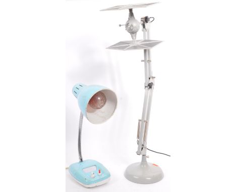 Two retro vintage 20th century desk table lamp lights. The lot to include a Star Wars themed table lamp having a space ship s