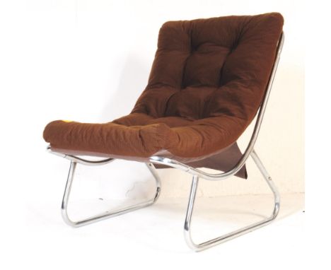 A retro vintage mid 20th century chrome brown chair. With overstuff brown fabric on a tubular metal frame. Comes apart for ea