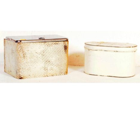 A pair of vintage retro mid 20th century circa. 1950's enamel bread bins, both in a white colourway with one having chrome li