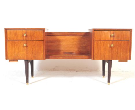 A retro vintage mid 20th century circa. 1960's teak dressing table having twin bank of drawers to each side with top drawer h