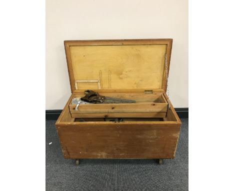 A large pine box containing joiners hand tools 