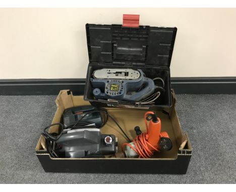 A box of three electric power tools, small tool box containing a sander 