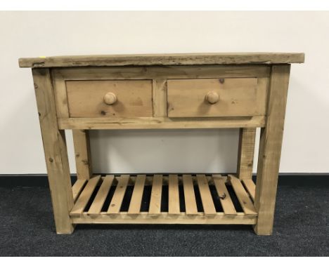 A reclaimed pine kitchen preparation table, fitted two drawers, with under shelf 