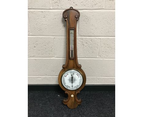 A walnut banjo barometer with enamelled dial 