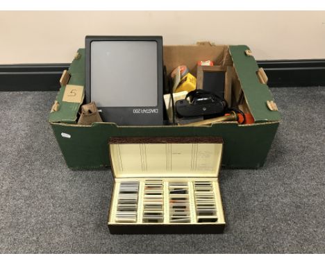 Two boxes containing vintage chemist bottles, beer steins, assorted cameras and accessories.