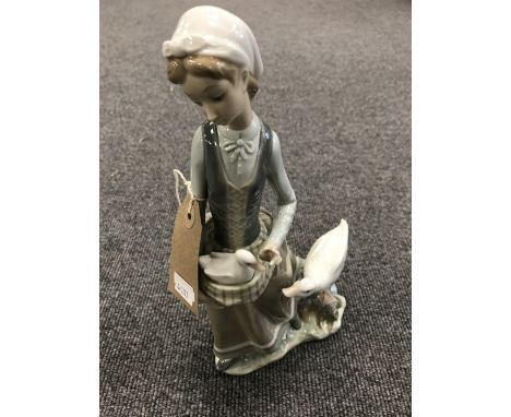 A Lladro figure - girl with geese 