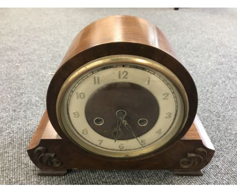 A walnut cased Smiths mantle clock, with pendulum and key 