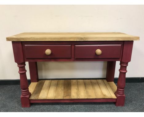 A reclaimed pine kitchen work table fitted a drawer with shelf beneath on painted base 