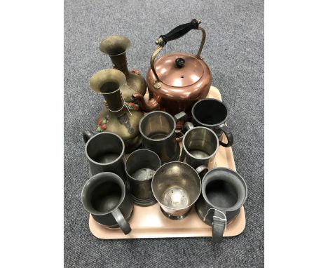 A tray containing pewter and painted tankards, a pair of Eastern brass vases together with a vintage copper kettle