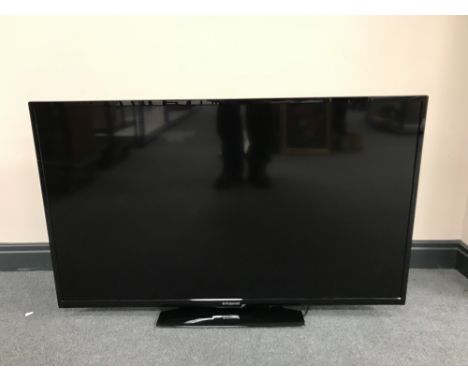 A Polaroid 40" LCD TV with lead, remote and instructions 