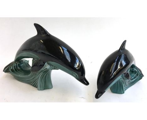 Two Poole Pottery dolphins (medium and large) 