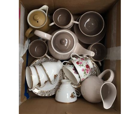 A quantity of Poole Pottery tea wares and others including Denby and Royal Albert 