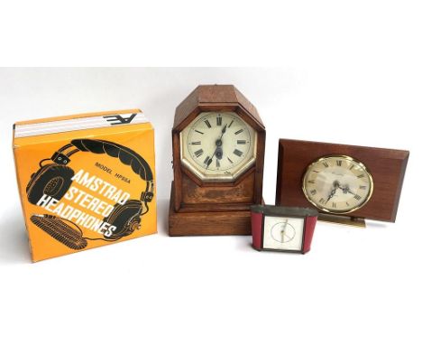 An oak cased mantel clock, Roman numerals to dial, together with two alarm clocks, and a pair of Amstrad stereo headphones 