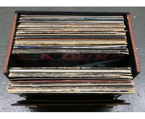 A lot of vinyl LPs to include The Beatles, Creedence Clearwater Revival, The Rolling Stones, Pink Floyd, Tom Petty, Roy Harpe