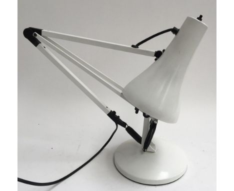 A white anglepoise lamp 