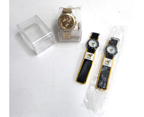 A Swatch watch in original packaging with paperwork, purchased in 2010 with receipt; together with a pair of London Wasps wri