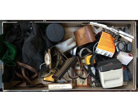 A mixed quantity of photographic accessories and a small barometer, in a case 