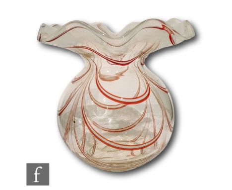 A late 19th Century Thomas Webb &amp; Sons Filamentosa vase of spherical form with large everted wave rim, decorated with red