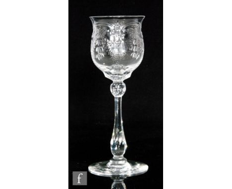 An early 20th Century Thomas Webb &amp; Sons clear crystal wine glass with an ovoid bowl with everted rim polished intaglio c