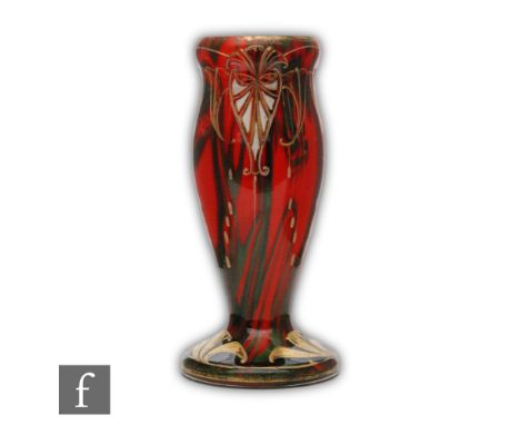 A late 19th to early 20th Century Harrach Art Nouveau glass vase in the Formosa pattern, of footed ovoid form with swollen co