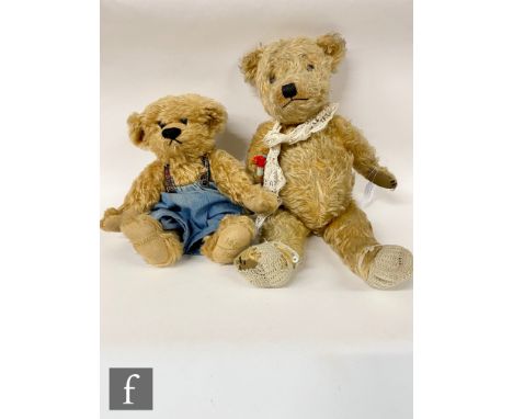 A mid 20th Century teddy bear, probably Chiltern, with blonde mohair, amber and black glass eyes and vertically stitched nose