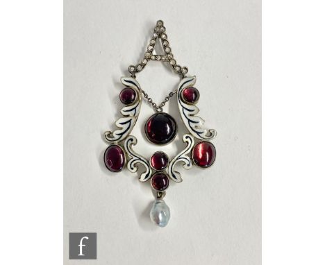 A 19th Century white metal garnet, diamond and pearl pendant, the diamond set letter A above the black and white enamel frame
