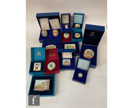 Fourteen Halcyon Days enamel boxes, to include Christmas examples, Easter eggs, and others, all boxed. (14) 